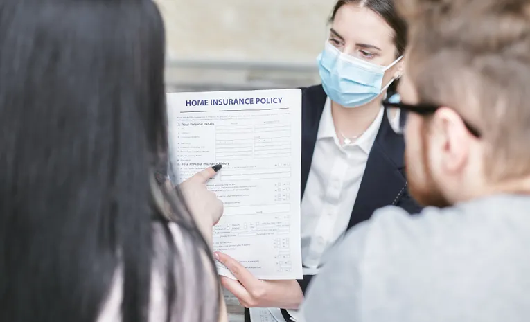 Insurance policy document being reviewed