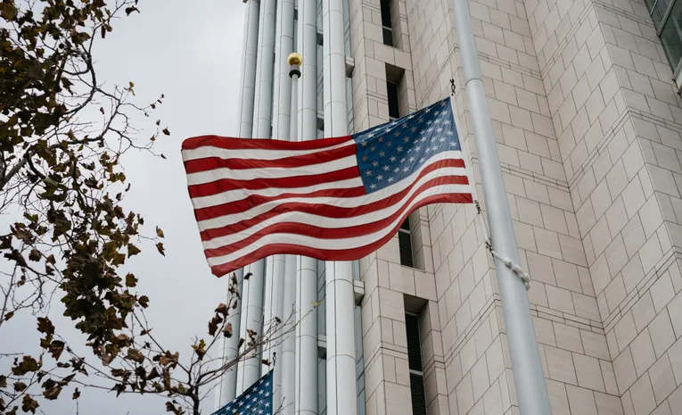 American flag in front of a government building