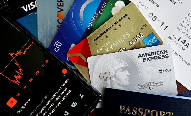 Flat lay of credit cards and travel documents