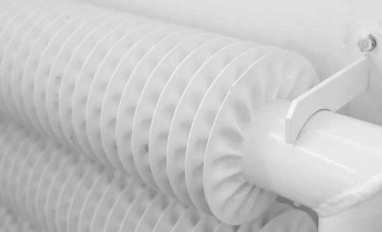 White radiator mounted on a wall