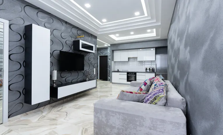 Grey sofa with colourful cushions in a modern living room
